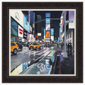 Rainy Night, Times Square Framed Print by Jo Quigley